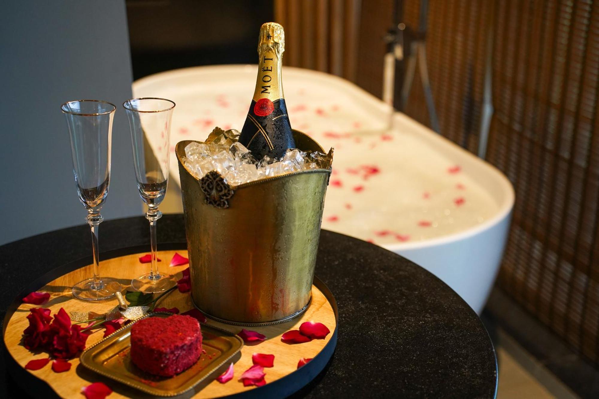 Radisson Resort And Spa Lonavala Exterior photo A bottle of Moët & Chandon champagne