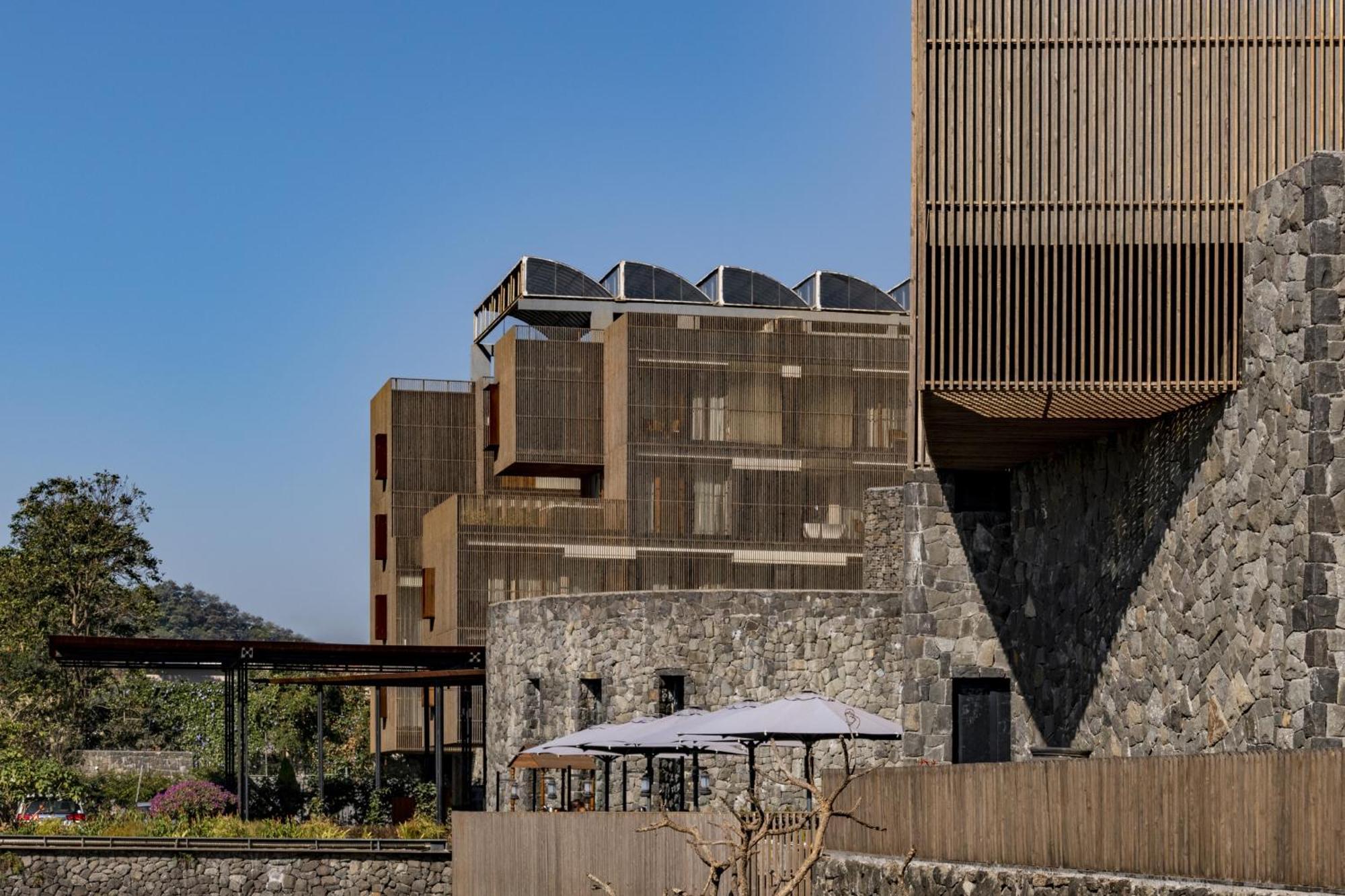Radisson Resort And Spa Lonavala Exterior photo The hotel's main building