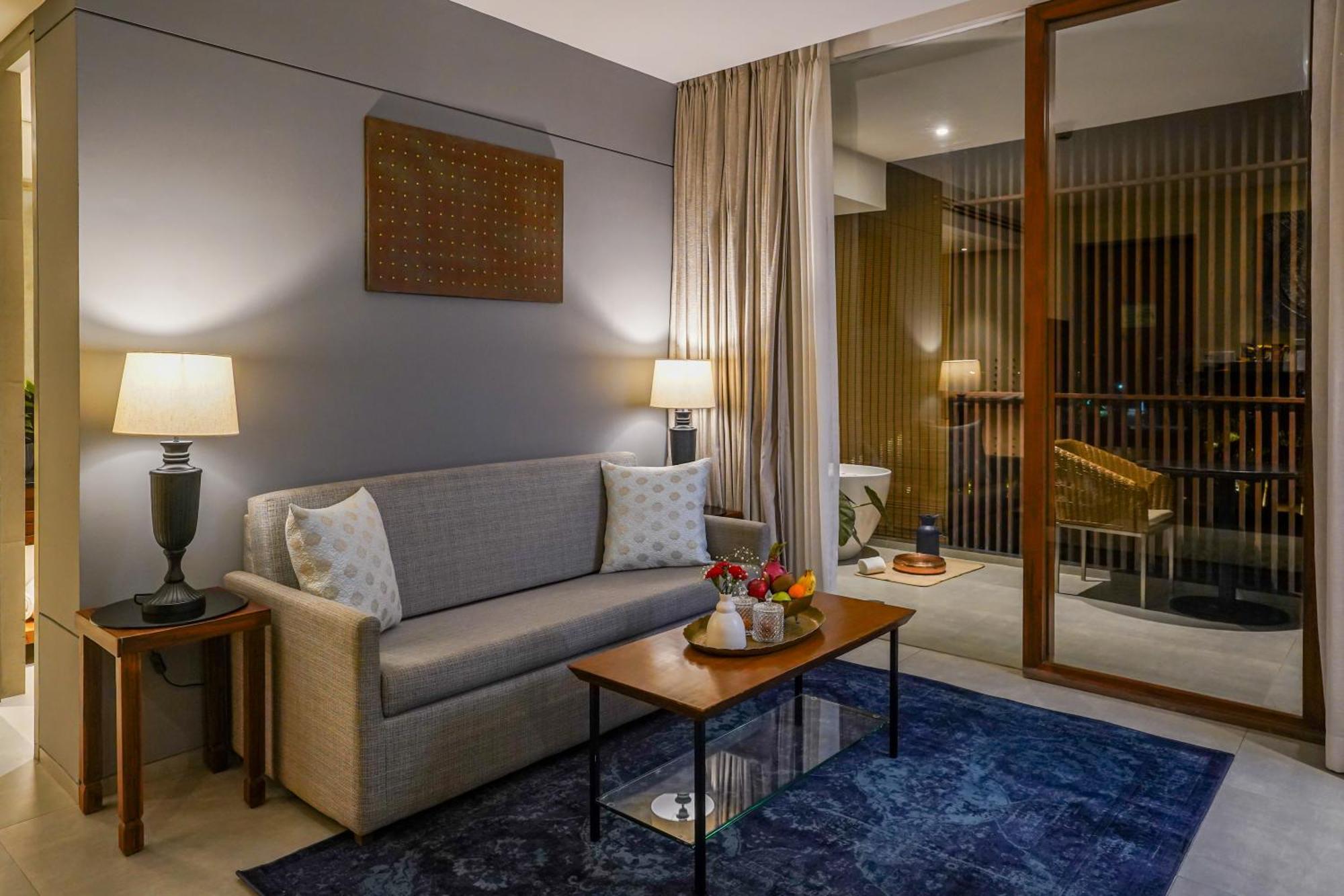 Radisson Resort And Spa Lonavala Exterior photo A living room at the hotel